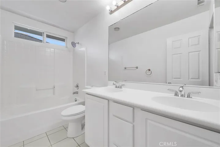 Hallway full bathroom on upper level.