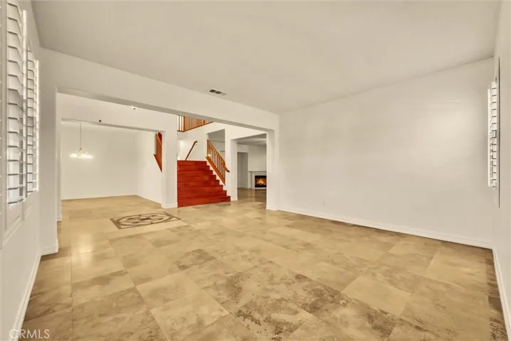 Living room view to main stairway.
