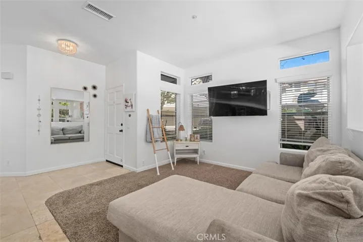 Light-filled main living space with modern finishes, creating a comfortable setting for both everyday living and entertaining.