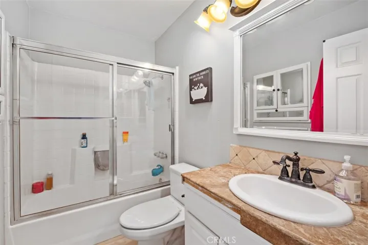Comfortable primary bedroom with soft natural light, neutral finishes, and ample space to create a relaxing retreat.