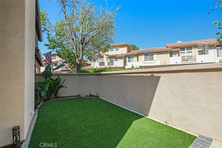 Very few units have this wrap around backyard. More so, it backs to a very secluded greenbelt. This location is ideal.