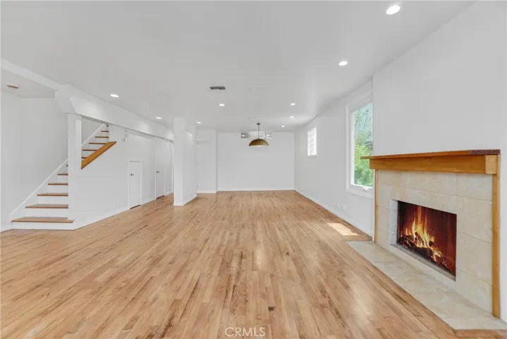 Living roon and Dining room with a fireplace