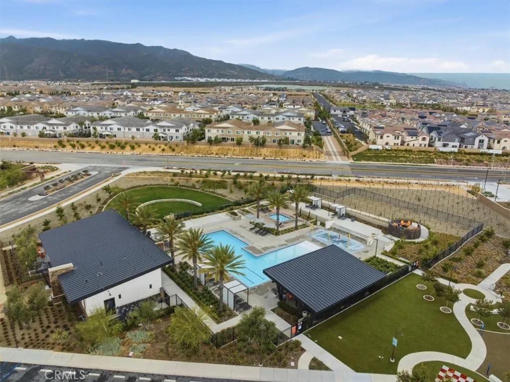 Aerial Community View of Pool, Splash Pad, BBQ, and Playground by the Fire Station