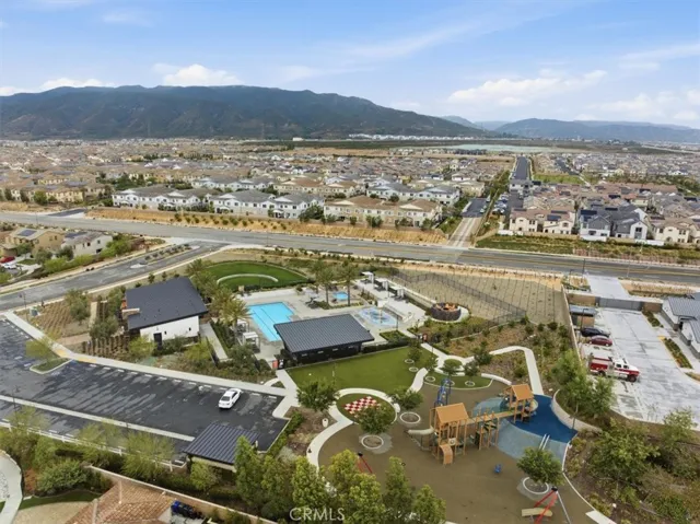 Aerial Community View of Pool, Splash Pad, BBQ, and Playground by the Fire Station