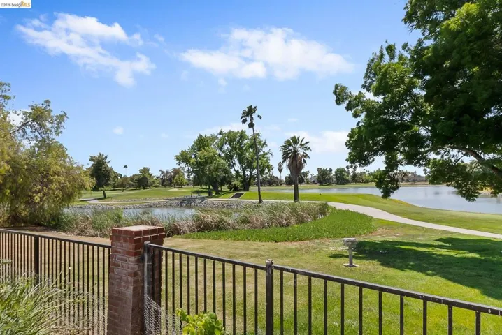 View of yard with a water view