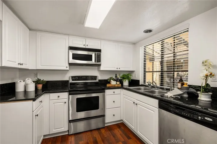 White Cabinets, Stainless Steel Appliances