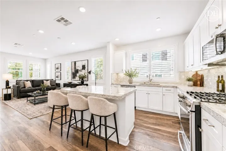 E-staging the living and kitchen area
