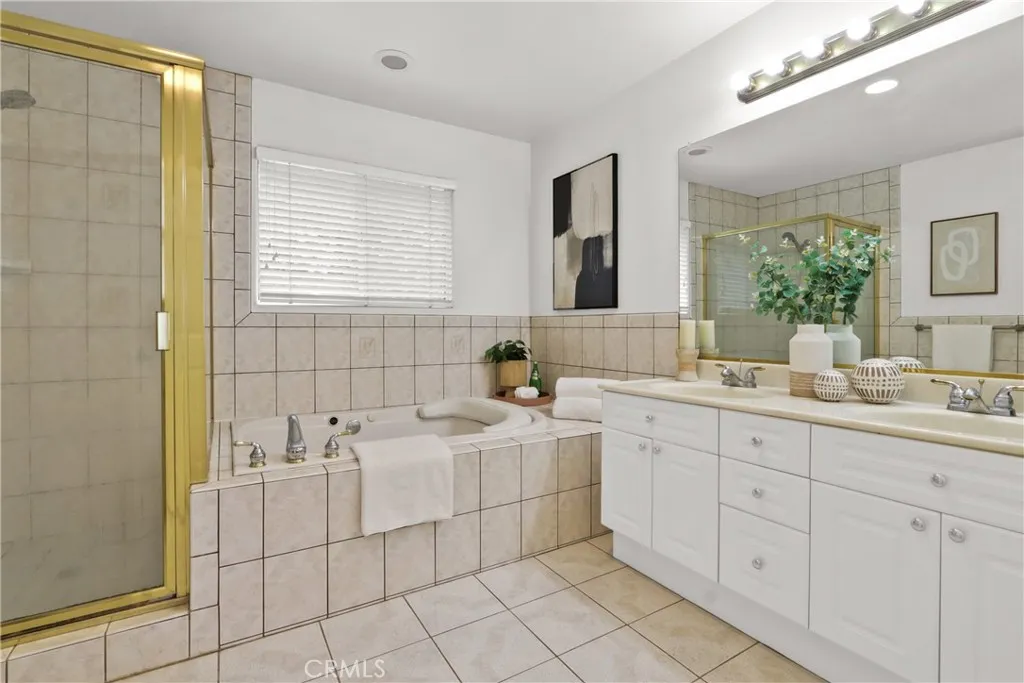 Master Bathroom with a jetted tub