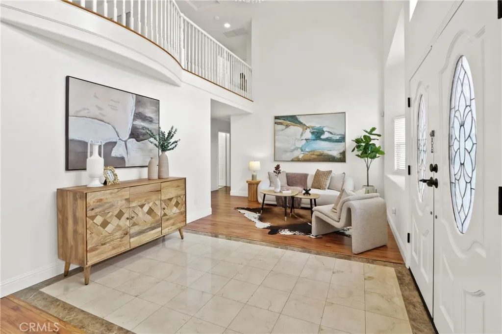 Two-story high foyer with lots of natural lighting