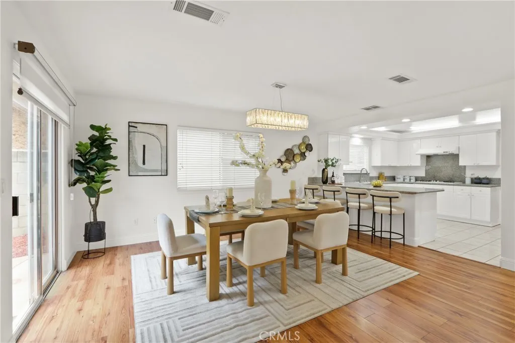 Spacious dining room with patio slider to the backyard
