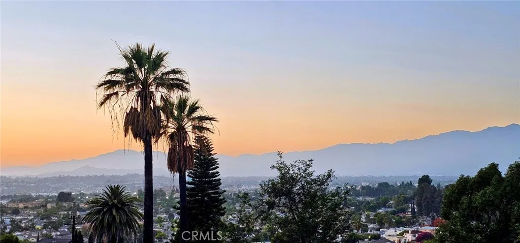 Beautiful sunset, city lights and mountain views