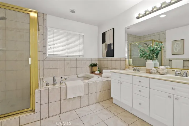 Master Bathroom with a jetted tub