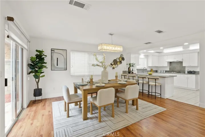 Spacious dining room with patio slider to the backyard