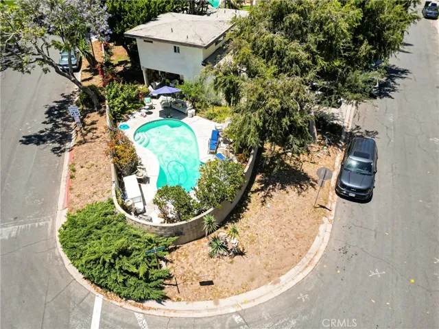 DRONE SHOT OF POOL AND HOUSE
