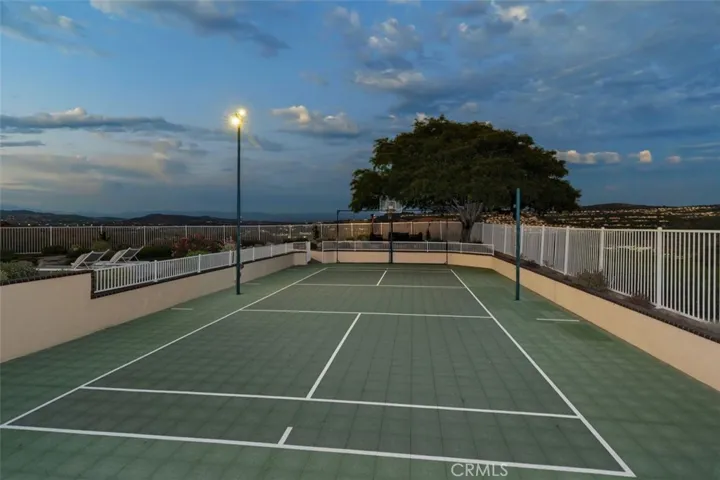 Flood lit sports court.