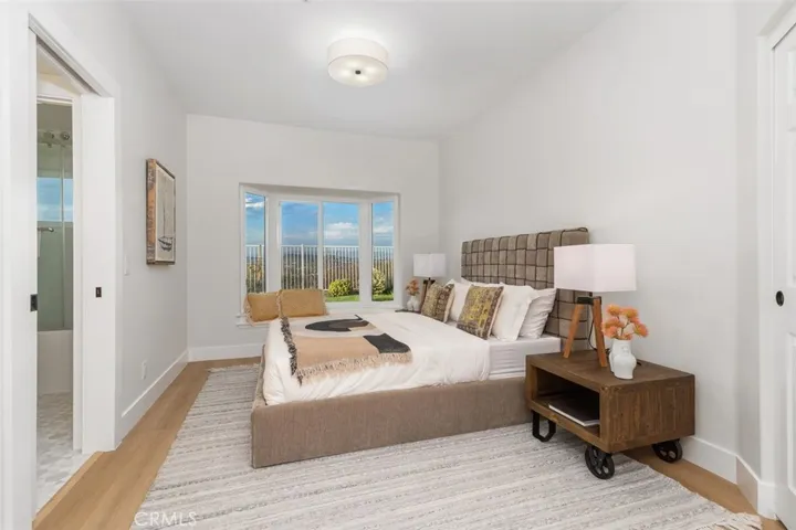 Downstairs bedroom with en suite bathroom.