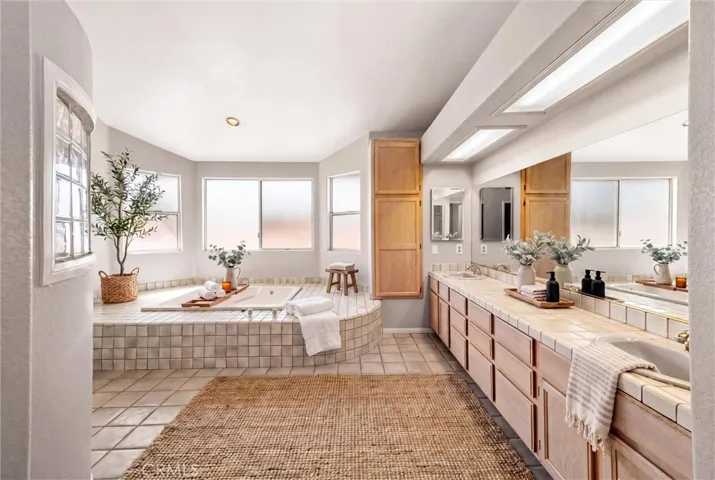 Primary suite bathroom virtually staged