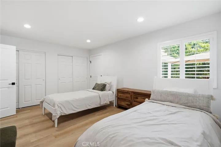 Down Stairs Master Bedroom #1 with Master Bathroom #1 with 4 Doors Build in Closets