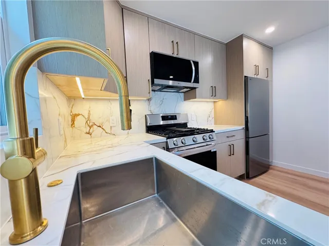 Absolutely stunning kitchen with ample cabinets