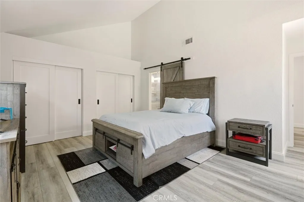 Primary Bedroom with Vaulted Ceilings and En-suite bathroom