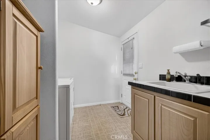 Laundry room with utility sink