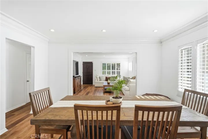 The formal living, dining, and family rooms flow into a showpiece modern kitchen