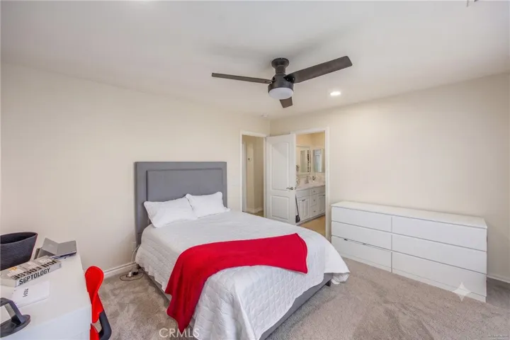 Spacious secondary bedroom with direct access to a full bathroom