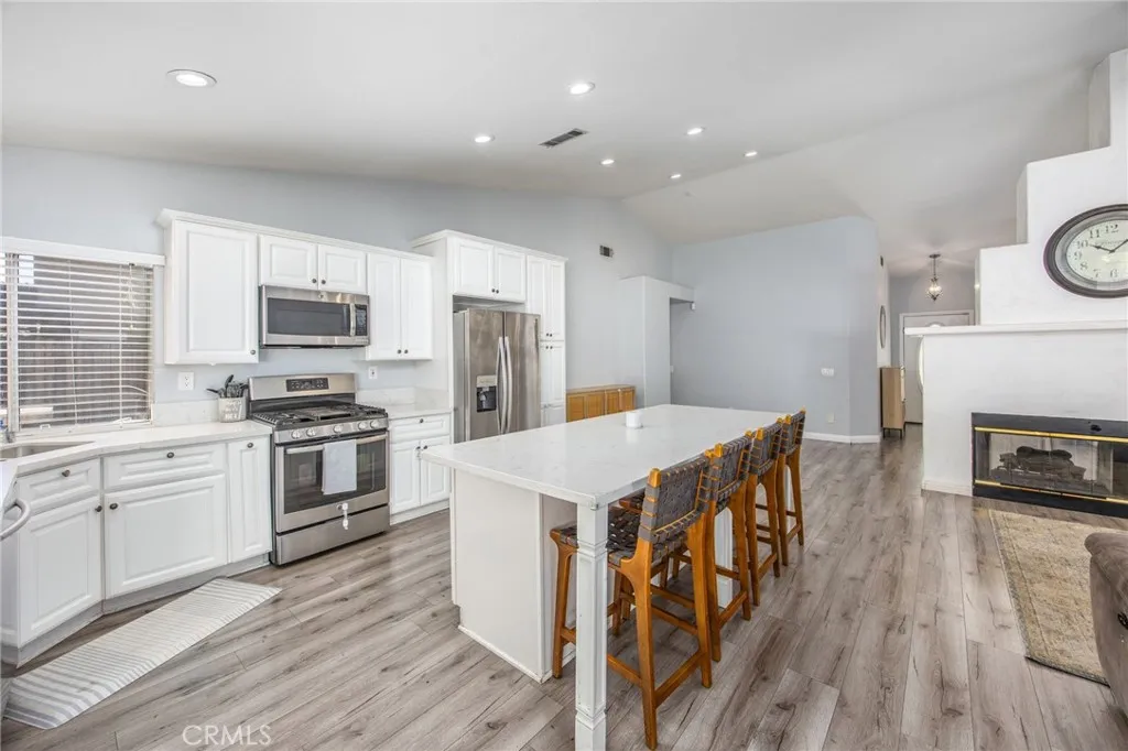 Kitchen offers generous cabinet and counter space for storage and meal preparation