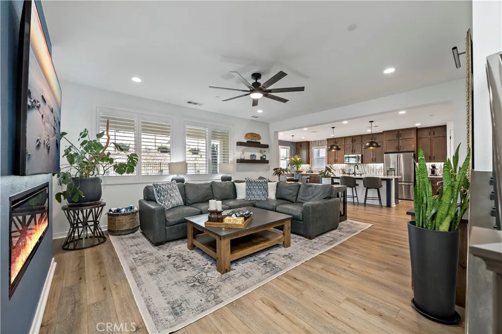 Great Room with recessed lighting, fireplace and ceiling fan
