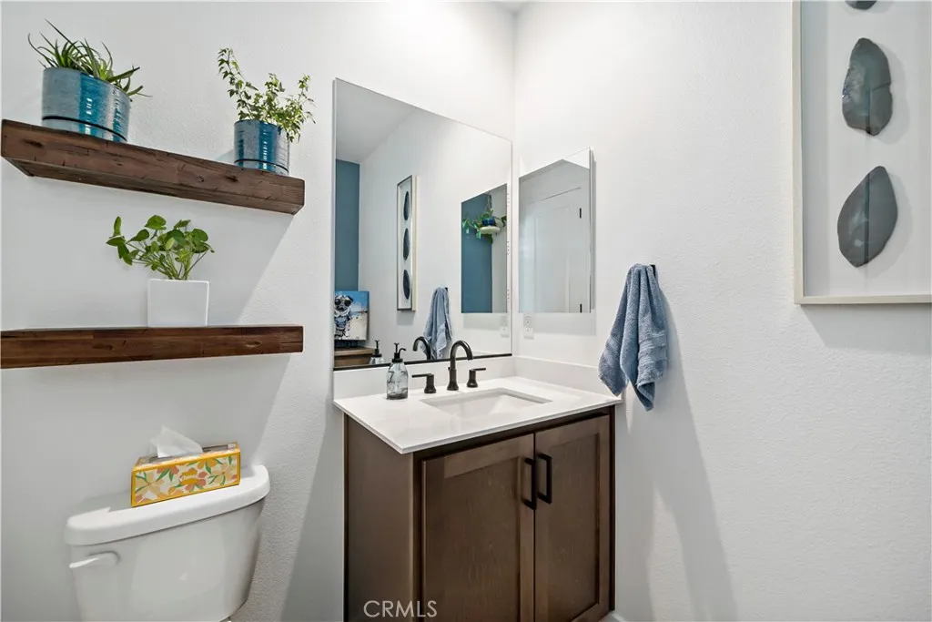Guest half bath with additional storage