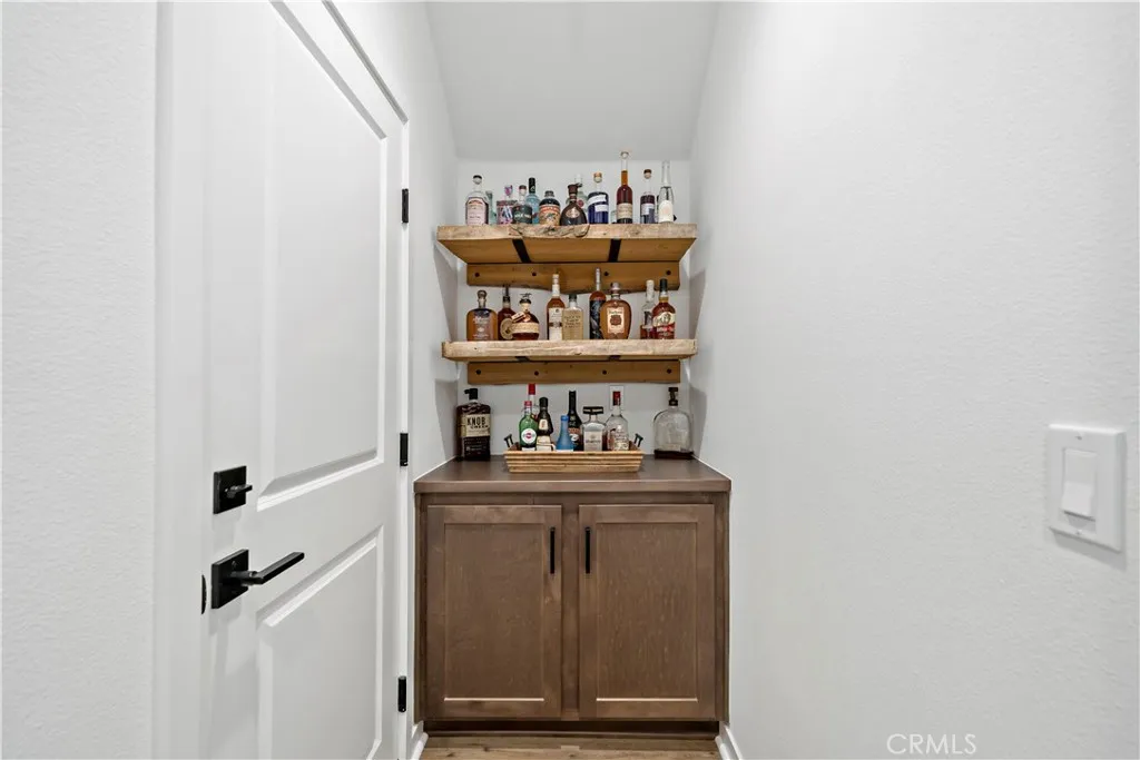 Built in cabinetry from garage access (barnwood shelves will not convey)