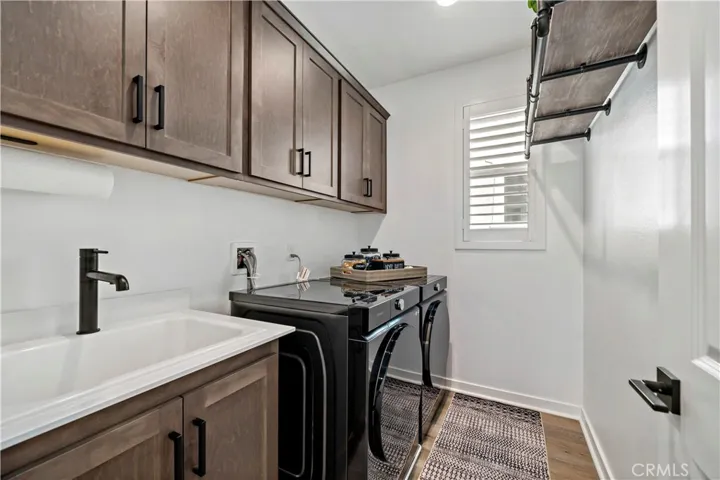 Laundry with additional cabinetry