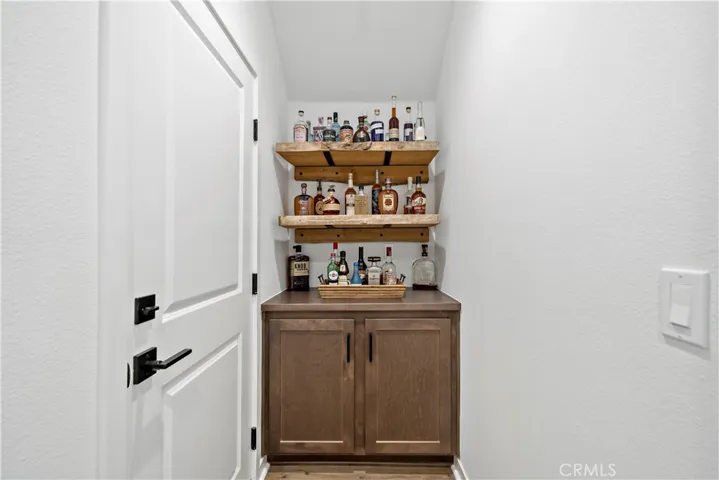 Built in cabinetry from garage access (barnwood shelves will not convey)