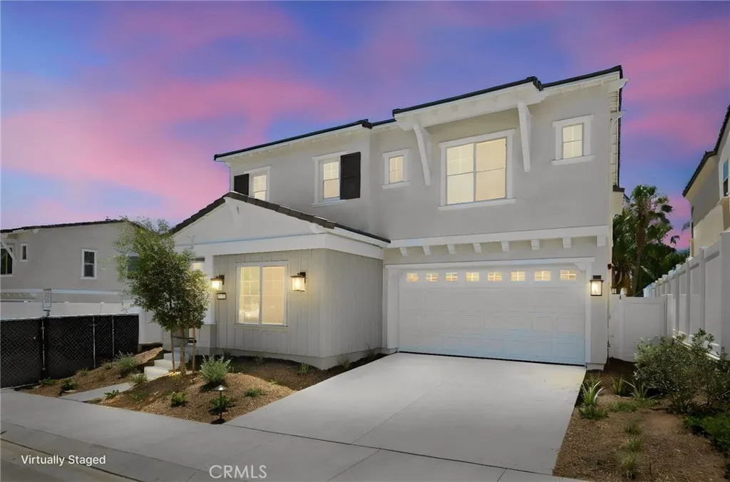 Front exterior photos are of the actual home. Back yard & interior photos are of the builder’s model home with the same floor plan and are for illustrative purposes only. Actual finishes, features, furnishings, and condition may vary. Home is under construction and will be delivered unfurnished.