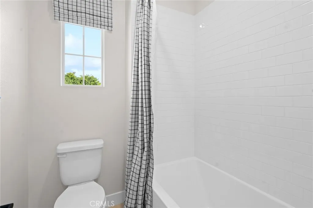 Front exterior photos are of the actual home. Back yard & interior photos are of the builder’s model home with the same floor plan and are for illustrative purposes only. Actual finishes, features, furnishings, and condition may vary. Home is under construction and will be delivered unfurnished.