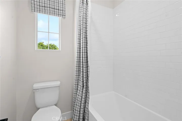 Front exterior photos are of the actual home. Back yard & interior photos are of the builder’s model home with the same floor plan and are for illustrative purposes only. Actual finishes, features, furnishings, and condition may vary. Home is under construction and will be delivered unfurnished.