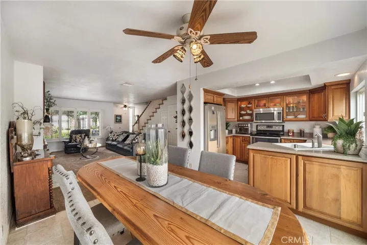 Open concept floorplan with kitchen, dining room, and living room all open light and bright