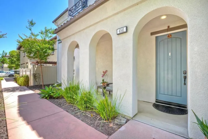 Welcome to this inviting home down a private sidewalk.