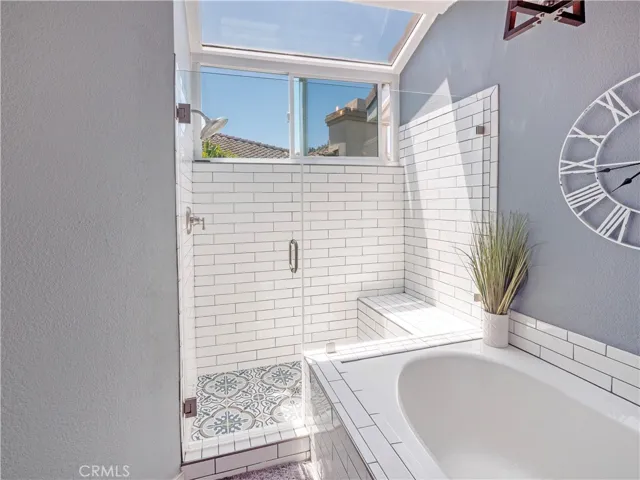 Separate soaking tub.