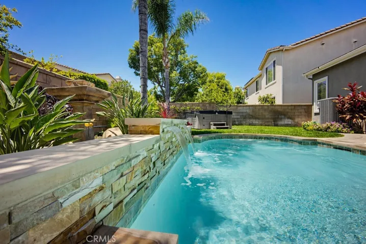 Water falls into sparkling pool