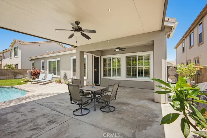Cover patio with built-in fan