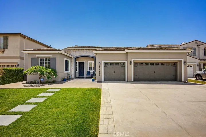 Landscaped and three car garage