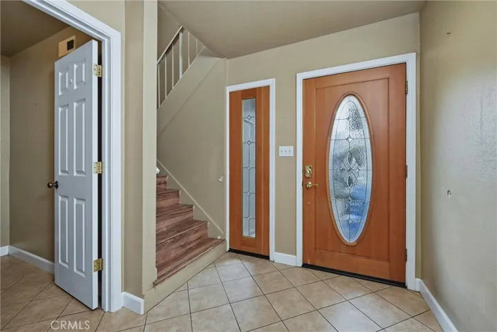 Front door, stairs to the right to upstairs.