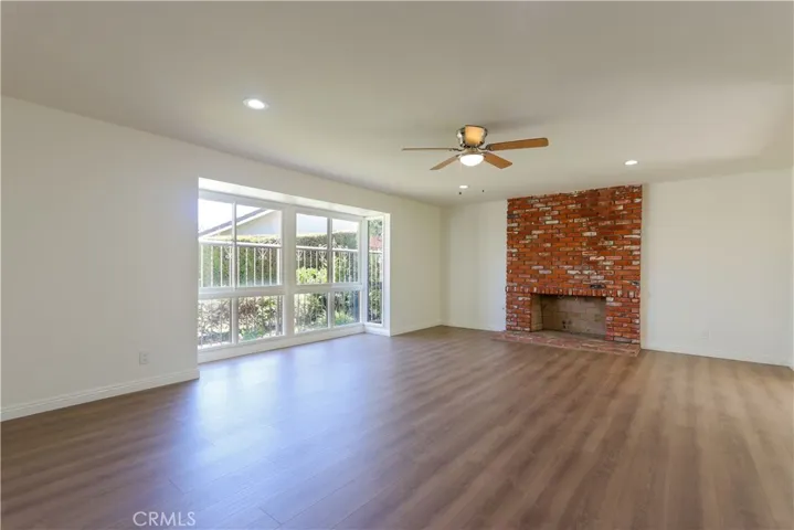 Living room, fireplace, front windows