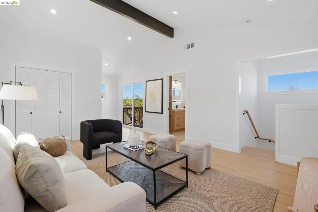Bedroom, second living room, or office with closet, bathroom, deck