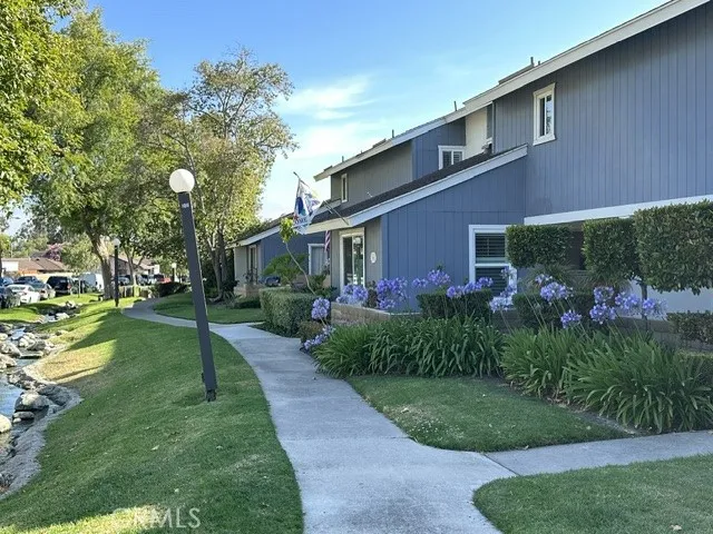 Community walk ways next to flowing creek