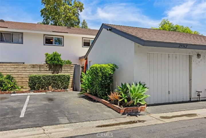 one dedicated parking space and one car garage 1