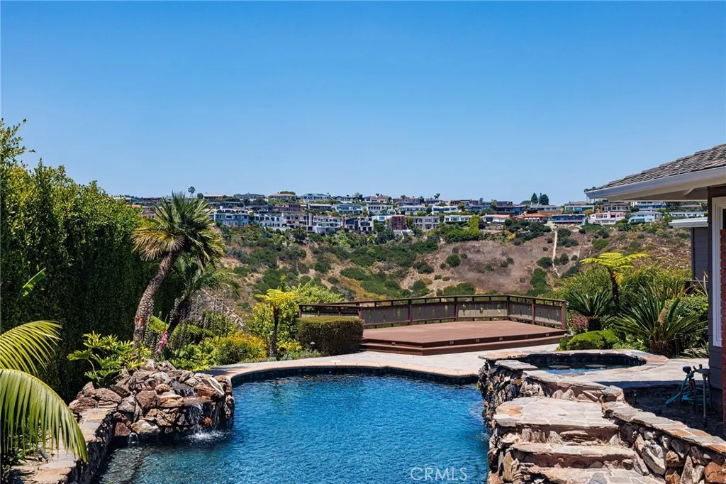 Yard with pool and spa.