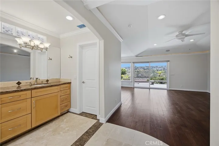 Primary bath and bedroom