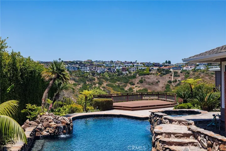 Yard with pool and spa.